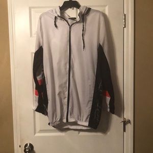 Black, white. Pink windbreaker